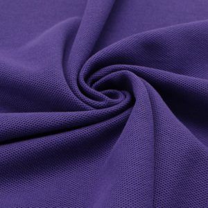 Lacoste Piqué cotton sustainable fabric material with textured knit pattern

