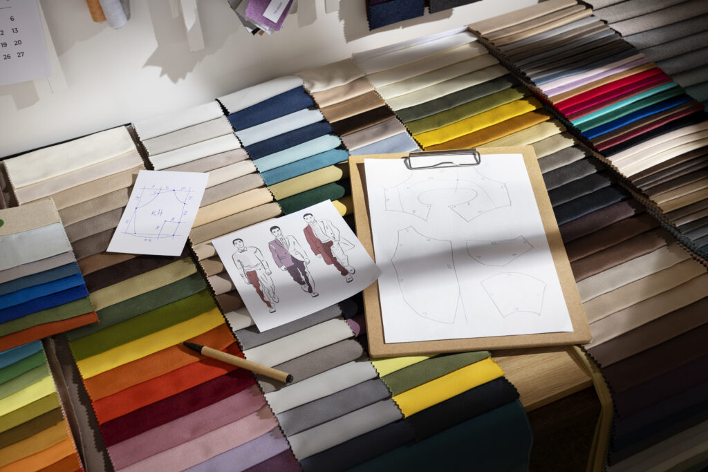 Fabric swatches of cotton-polyester, polyester-spandex, and viscose-linen with a fashion sketch overlay.