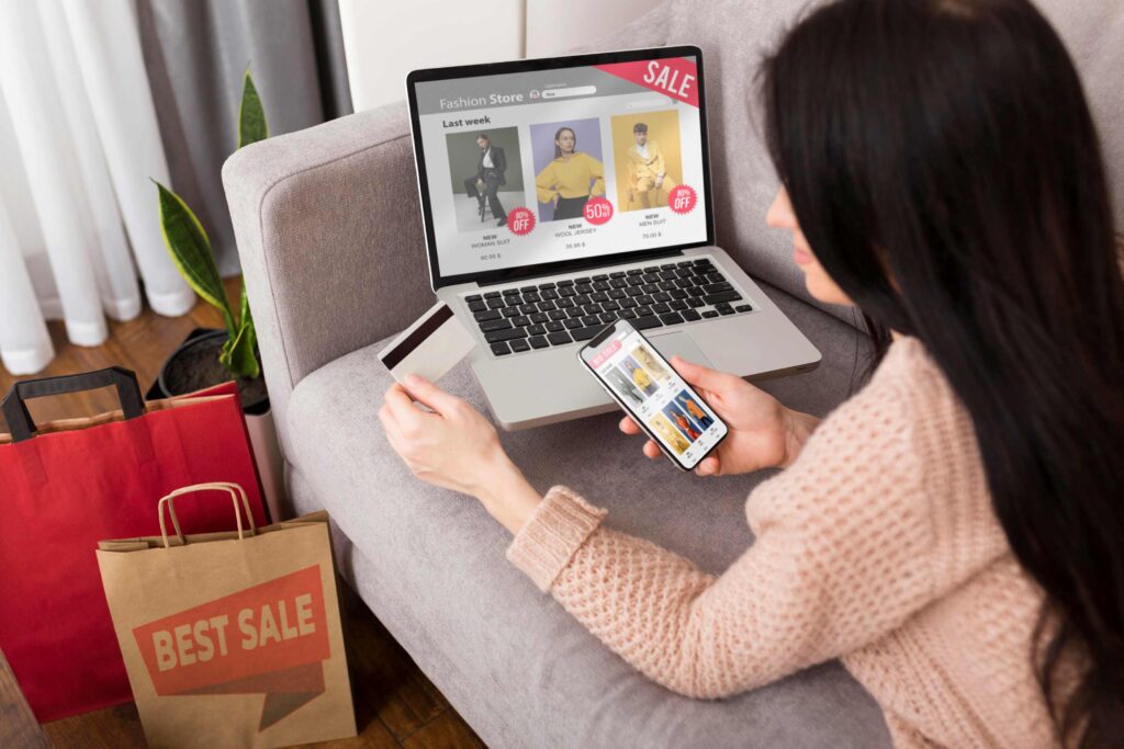 Gen Z consumer browsing fashion online with laptop and smartphone, illustrating Gen Z and Gen Alpha fashion behavior visual discovery
